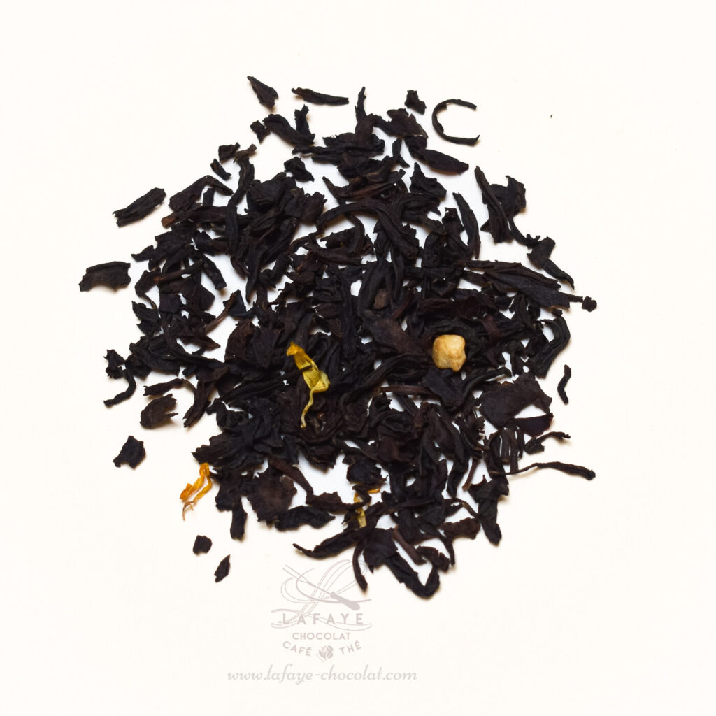Arc en ciel: thé noir de Chine non fumé aromatisé à l'orange, amande et pêche
